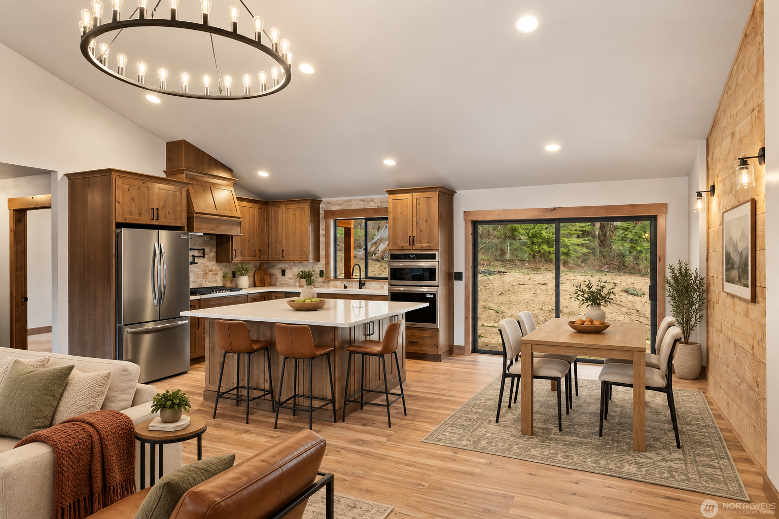 Virtually staged kitchen and dining area viewed from the great room