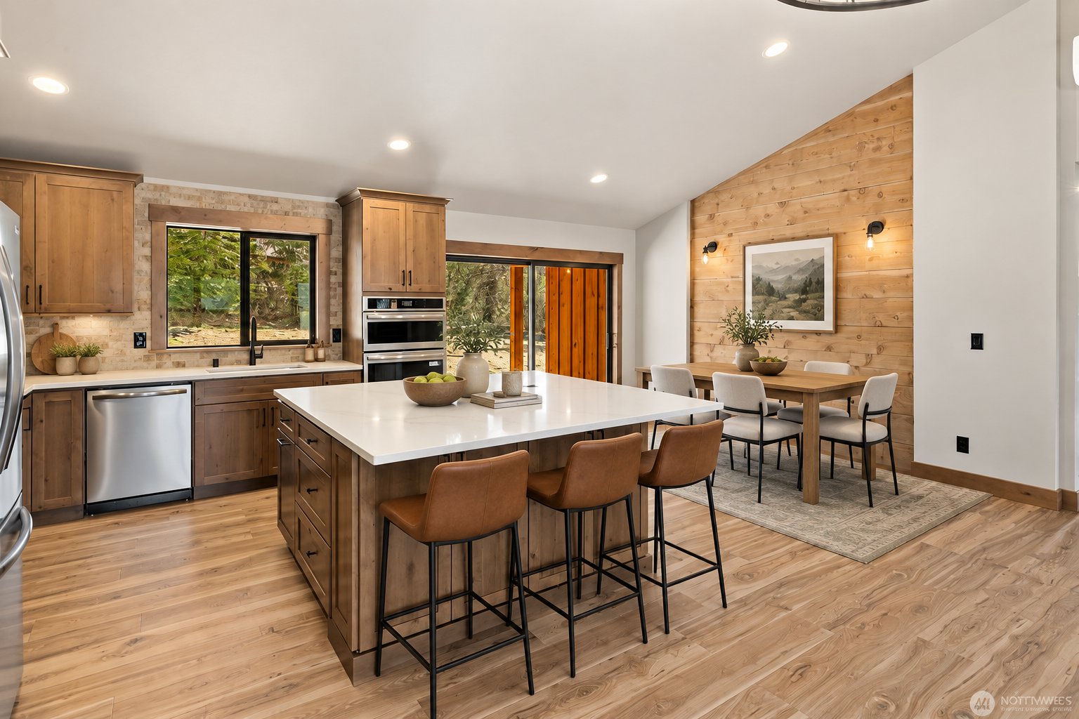 Virtually staged kitchen and dining area